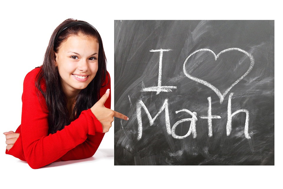 a girl and black board