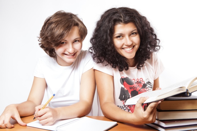 smiling women studying